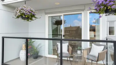 The private balcony extends your living space and offers partial views of Elliott Bay, the  downtown skyline, and the Space Needle. A perfect spot for morning coffee or evening  cocktails.