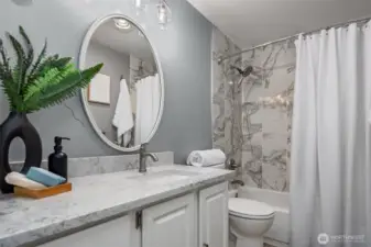 The full bath next to the 2nd bedroom