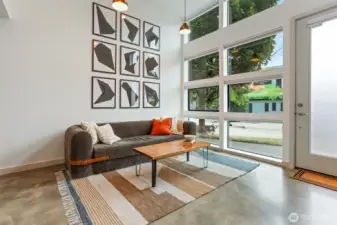 Pull out couch for guests, dramatic celinings for wow factor
