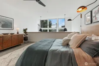 Nearly 20 foot ceilings, and automatic blinds at the touch of a button.