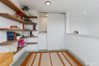 Solid oak shelves and convenient laundry.