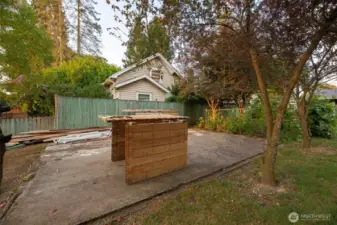 Concrete pad in back yard.