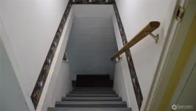 Entry to the basement with 2 mostly finished rooms