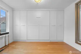 2nd bedroom with pull-down Murphy bed makes this a versatile space.