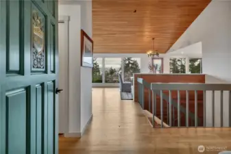Entrance to the home. Open stairwell to fully finished downstairs.