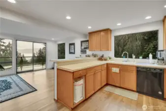 Eating bar area, looking into dining area and outside to the upper deck.