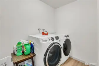 Separate laundry room downstairs.