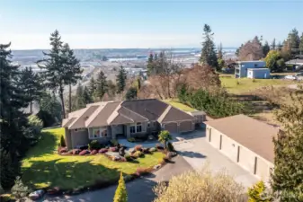 3184 square foot, one level main house with attached 1052 square foot garage. PLUS  1800 square foot attached garage and shop. PLUS detached ADU featuring 981 square feet of one level living with an attached 2 car garage