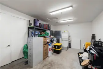The attached garage features a separate built in storage area plumbed for a dog shower, laundry set up and direct access to a dog run outside making this a great animal friendly space