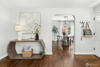 The living room seamlessly flows into the dining room.