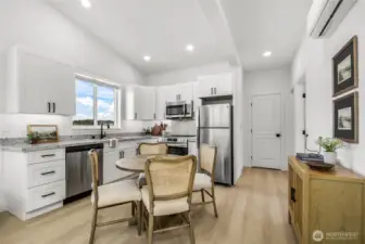 Another view of the kitchen.  Note the stunning vinyl plank flooring!