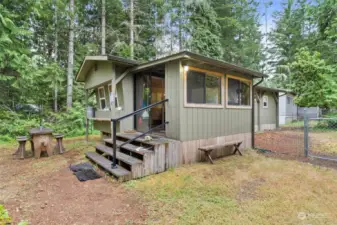 Sweet little 1950s manufactured home turned cabin.