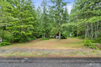 From the road the driveway is on the left and RV spots on the right. Plenty of space to park a boat too!