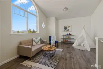 HUGE BONUS ROOM: Large window with stunning neighborhood view. Versatile loft-like area. Realist notated this as a 4th bedroom. May be non-conforming.