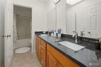Primary Bathroom. Fully updated. Features Dual-Sink & Skylight.