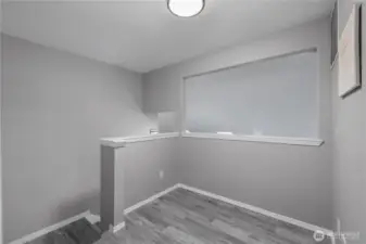 Bonus area at the top of the stairs, great place for a desk.