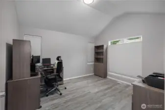 Off the entry - your private den or 4th BR (no closet).