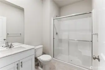 spacious, light and bright bathroom on the main level!