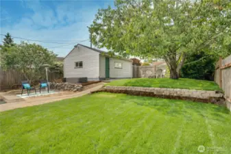 This yard has multiple spaces to entertain and host. Share stories on the patios or roast a s'more next to the firepit. Either way, you've got it made!