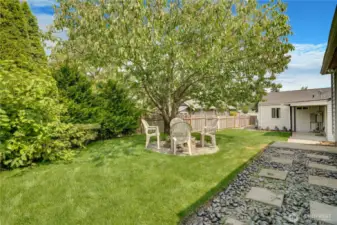 The backyard is full of mature landscaping. The cherry and plum trees are excellent yearly producers! Break out your best recipes!