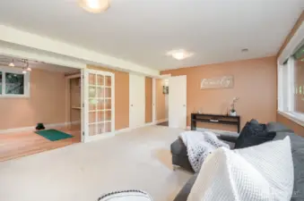 Located off of lower level living area, this 5 bedroom is currently being used as a workout and craft area.