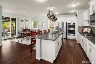 Easy maintenance engineered hardwoods throughout the main floor.