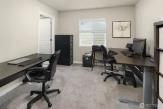 Office area...or playroom or whatever is needed. Door leads to laundry room.