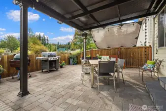 Covered brick patio.  Who cares if it rains?