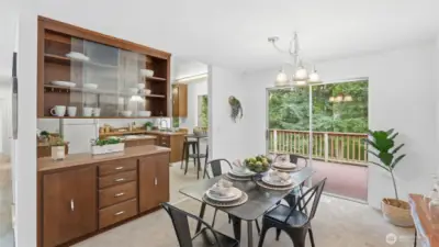 Built-in cabinetry provides charm and extra storage between kitchen and dining area.