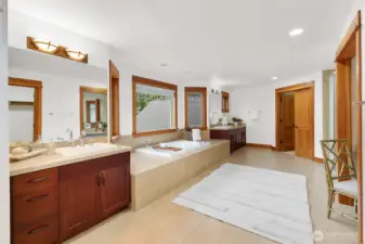 Spa inspired primary bath with two walk-in closets