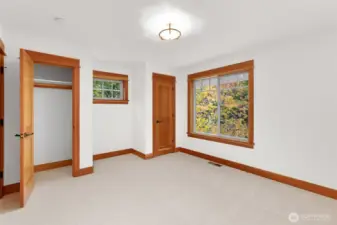 2nd Bedroom on the upper level features two closets