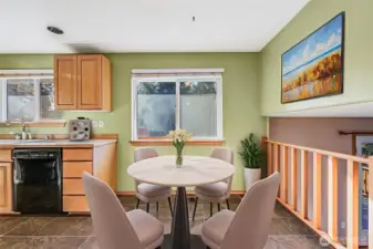 Thiis virtually staged photo shows one way to use the space at the north end of the galley-style kitchen.