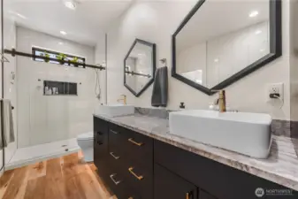 Double sinks, tiled walk in shower