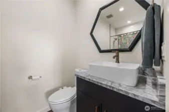 Full bathroom next to bedrooms (across house from primary)