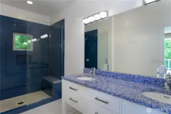 DADU has full bedroom, bathroom, living room, and staircase to upstairs deck and viewing room.