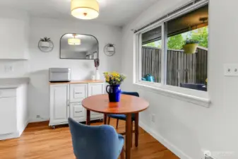 Charming dining nook just off the kitchen, with views of the garden creating the perfect backdrop for everyday dining.