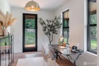 Main floor office/flex space with porch entrance
