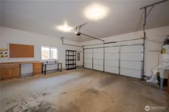Large attached 2 car garage with plenty of space for hobbies and storage