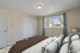 VIRTUALLY staged primary bedroom