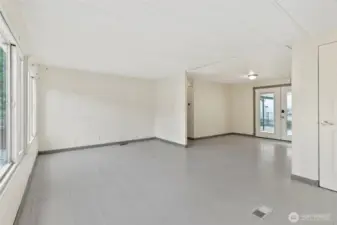 Living room 18'x11' looking back into the dinning area.