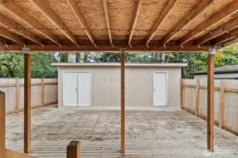 Back deck with large storage shed.