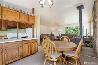 Open concept living area with vaulted ceilings & lots of natural light.