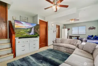 Lower level has its own separate access, amazing views. Door on the left accesses the upper level, door in the middle leads to the garage, door to the right is the 3/4 bath. Possible MIL apt.