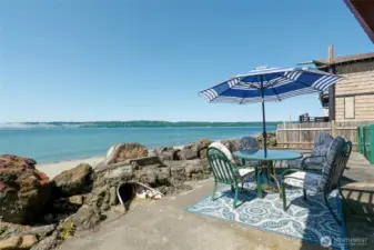 Enjoy these Southerly views from the hot tub or the brand new deck. Cement steps & firepit are both built into the bulkhead.