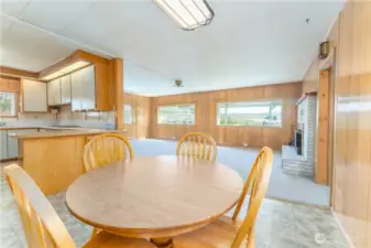 Upper dining room with open space concept and lots of light.