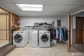 Laundry on lower level with washer and dryer.
