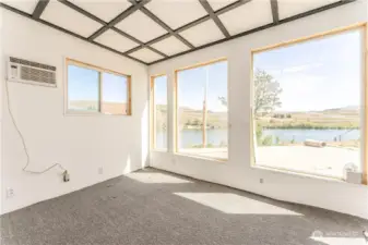 Sun room faces north also overlooking the Columbia River.