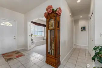 View of front door, office and hallway leading to bedrooms