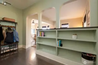 Front entry welcomes you with charming built-in cabinetry that highlights the home’s timeless character.