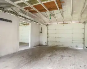 Detached garage with convenient alley access provides easy parking and added functionality.